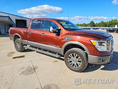 Czwarte zdjęcie samochodu z boku: 2017 NISSAN TITAN XD PLATINUM RESERVE VIN:1N6BA1F40HN548548 - miniatura
