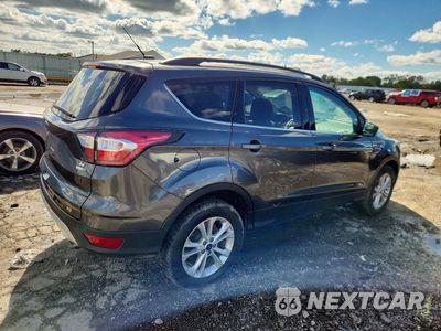 Trzecie zdjęcie samochodu z tyłu: 2017 FORD ESCAPE SE VIN:1FMCU9GD3HUA84152 - miniatura
