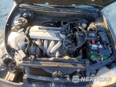 Zdjęcie 11 z 12 samochodu: 1999 CHEVROLET GEO PRIZM BASE VIN:1Y1SK5285XZ406778 - miniatura