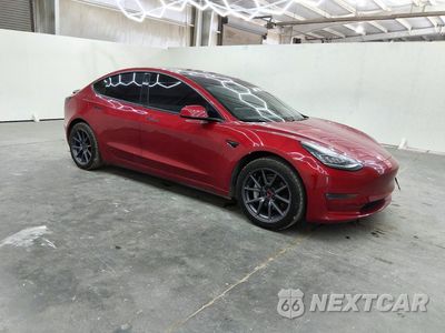 Czwarte zdjęcie samochodu z boku: 2018 TESLA MODEL 3 VIN:5YJ3E1EA4JF007204 - miniatura