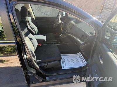 Piąte zdjęcie samochodu w środku: 2015 HONDA CR-V LX VIN:2HKRM4H36FH600941 - miniatura