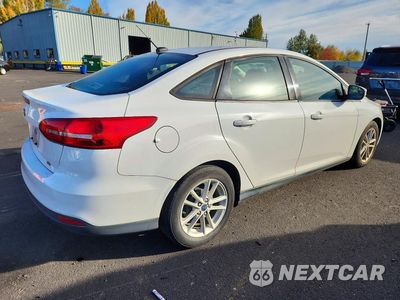 Trzecie zdjęcie samochodu z tyłu: 2017 FORD FOCUS SE VIN:1FADP3F24HL308750 - miniatura