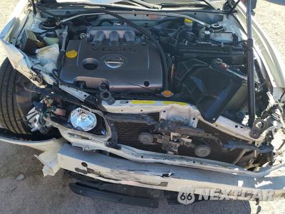 Zdjęcie 11 z 13 samochodu: 2002 NISSAN MAXIMA GXE VIN:JN1DA31D12T415558 - miniatura