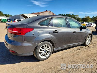 Trzecie zdjęcie samochodu z tyłu: 2017 FORD FOCUS S VIN:1FADP3E21HL263221 - miniatura