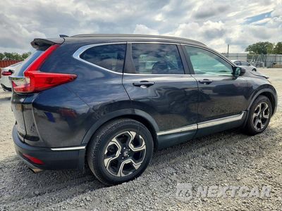 Trzecie zdjęcie samochodu z tyłu: 2017 HONDA CR-V TOURING VIN:7FARW1H99HE033322 - miniatura