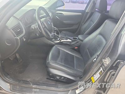 Zdjęcie 7 z 12 samochodu: 2014 BMW X1 SDRIVE28I VIN:WBAVM1C54EVW54711 - miniatura