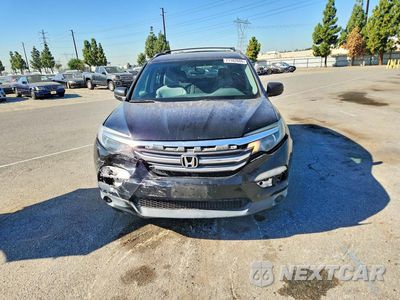 Piąte zdjęcie samochodu w środku: 2018 HONDA PILOT LX VIN:5FNYF5H17JB022091 - miniatura