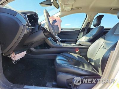 Zdjęcie 7 z 12 samochodu: 2014 FORD FUSION TITANIUM VIN:3FA6P0K93ER190424 - miniatura