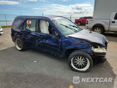 Czwarte zdjęcie samochodu z boku: 2005 HONDA CR-V LX VIN:JHLRD685X5C010414 - miniatura