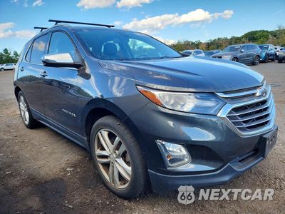 Czwarte zdjęcie samochodu z boku: 2018 CHEVROLET EQUINOX PREMIER VIN:2GNAXWEX3J6161080 - miniatura