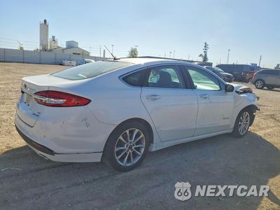 Trzecie zdjęcie samochodu z tyłu: 2017 FORD FUSION SE HYBRID VIN:3FA6P0LU6HR158994 - miniatura