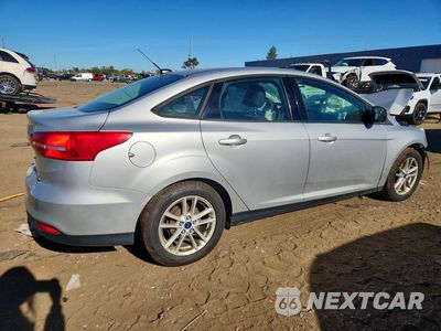 Trzecie zdjęcie samochodu z tyłu: 2016 FORD FOCUS SE VIN:1FADP3F27GL277816 - miniatura