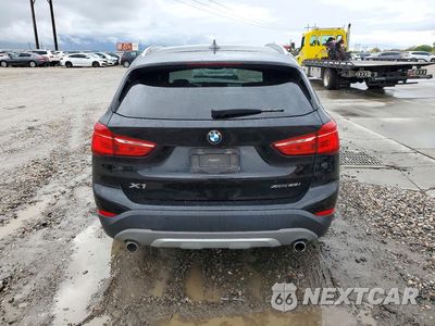 Zdjęcie 6 z 12 samochodu: 2018 BMW X1 XDRIVE28I VIN:WBXHT3C32J5L33633 - miniatura