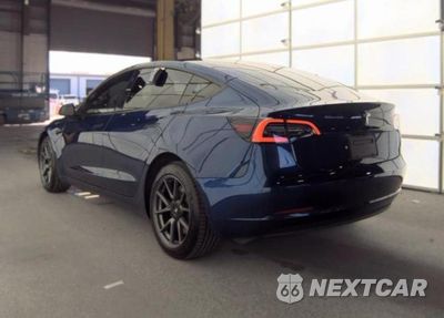 Trzecie zdjęcie samochodu z tyłu: 2021 TESLA MODEL 3 VIN:5YJ3E1EA9MF090469 - miniatura