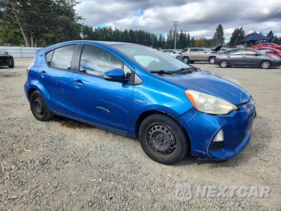 Czwarte zdjęcie samochodu z boku: 2014 TOYOTA PRIUS C THREE VIN:JTDKDTB39E1562874 - miniatura