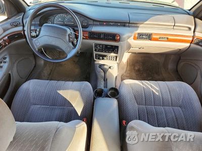 Zdjęcie 8 z 12 samochodu: 1994 CHRYSLER CONCORDE VIN:2C3HL56F1RH361852 - miniatura