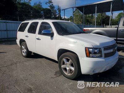 Czwarte zdjęcie samochodu z boku: 2010 CHEVROLET TAHOE C1500 LTZ VIN:1GNUCCE06AR108162 - miniatura