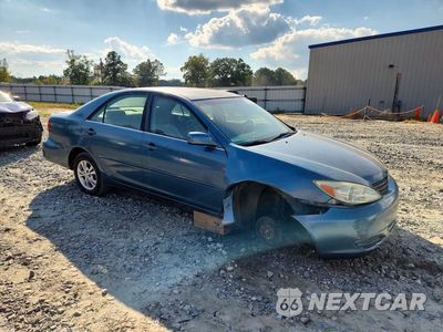 Czwarte zdjęcie samochodu z boku: 2004 TOYOTA CAMRY LE V6 VIN:4T1BF32K64U576029 - miniatura