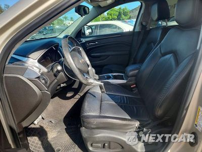 Zdjęcie 7 z 13 samochodu: 2013 CADILLAC SRX VIN:3GYFNAE35DS624745 - miniatura