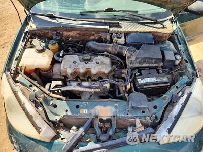 Zdjęcie 11 z 12 samochodu: 2001 FORD FOCUS LX VIN:1FAFP33P81W296096 - miniatura