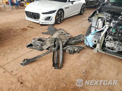 Zdjęcie 12 z 13 samochodu: 2013 TESLA MODEL S VIN:5YJSA1DP3DFP22430 - miniatura