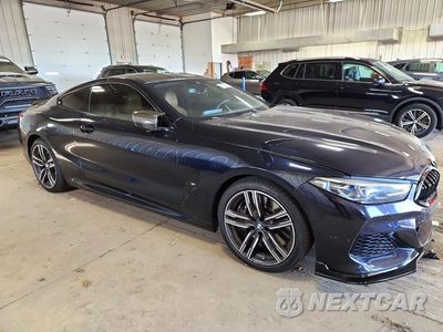 Czwarte zdjęcie samochodu z boku: 2019 BMW M850XI VIN:WBABC4C5XKBJ35800 - miniatura