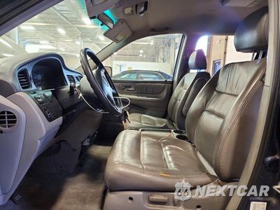 Zdjęcie 7 z 13 samochodu: 2004 HONDA ODYSSEY EXL VIN:5FNRL18084B063508 - miniatura
