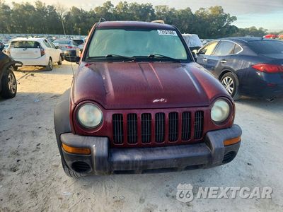 Piąte zdjęcie samochodu w środku: 2003 JEEP LIBERTY SPORT VIN:1J4GK48K93W622176 - miniatura