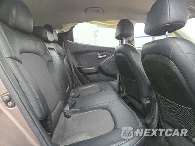 Zdjęcie 11 z 13 samochodu: 2011 HYUNDAI TUCSON GLS VIN:KM8JUCAC0BU257900 - miniatura