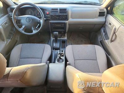 Zdjęcie 8 z 13 samochodu: 2004 ISUZU RODEO S VIN:4S2DM58W844308256 - miniatura