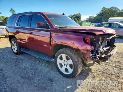 Czwarte zdjęcie samochodu z boku: 2016 CHEVROLET TAHOE C1500 LT VIN:1GNSCBKC2GR422707 - miniatura