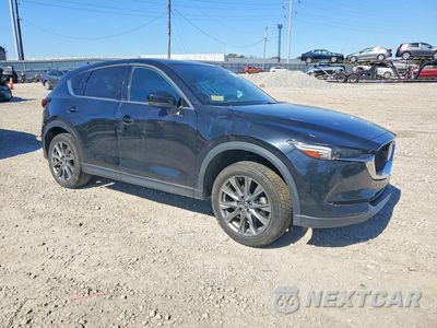 Czwarte zdjęcie samochodu z boku: 2021 MAZDA CX-5 SIGNATURE VIN:JM3KFBEY1M0346136 - miniatura