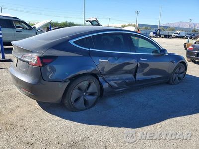 Trzecie zdjęcie samochodu z tyłu: 2020 TESLA MODEL 3 VIN:5YJ3E1EB5LF649619 - miniatura