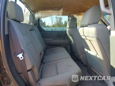 Zdjęcie 10 z 13 samochodu: 2011 HONDA RIDGELINE RT VIN:5FPYK1F29BB453394 - miniatura