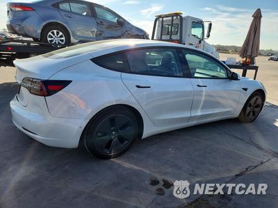 Trzecie zdjęcie samochodu z tyłu: 2021 TESLA MODEL 3 VIN:5YJ3E1EA6MF947833 - miniatura