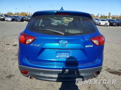 Zdjęcie 6 z 13 samochodu: 2014 MAZDA CX-5 SPORT VIN:JM3KE2BE9E0373969 - miniatura