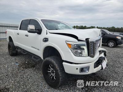 Czwarte zdjęcie samochodu z boku: 2016 NISSAN TITAN XD PLATINUM RESERVE VIN:1N6BA1F44GN516149 - miniatura