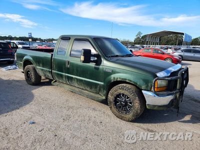 Czwarte zdjęcie samochodu z boku: 1999 FORD F250 SUPER DUTY VIN:1FTNX20F8XEB64871 - miniatura