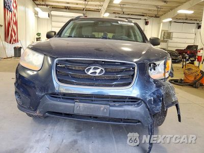 Piąte zdjęcie samochodu w środku: 2011 HYUNDAI SANTA FE GLS VIN:5XYZGDAG4BG071012 - miniatura