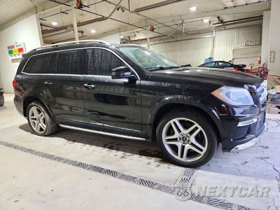Czwarte zdjęcie samochodu z boku: 2014 MERCEDES-BENZ GL 550 4MATIC VIN:4JGDF7DE9EA315665 - miniatura