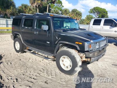 Czwarte zdjęcie samochodu z boku: 2003 HUMMER H2 VIN:5GRGN23U23H109588 - miniatura