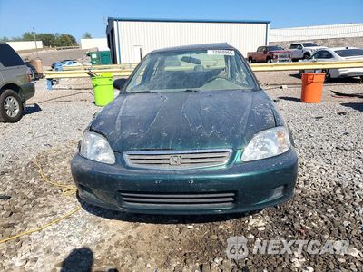 Piąte zdjęcie samochodu w środku: 1999 HONDA CIVIC LX VIN:1HGEJ6574XL015316 - miniatura