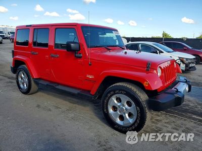 Czwarte zdjęcie samochodu z boku: 2015 JEEP WRANGLER UNLIMITED SAHARA VIN:1C4BJWEGXFL527971 - miniatura