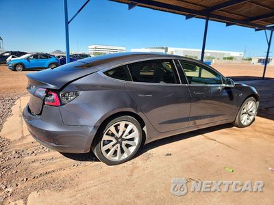 Trzecie zdjęcie samochodu z tyłu: 2018 TESLA MODEL 3 VIN:5YJ3E1EA8JF165562 - miniatura