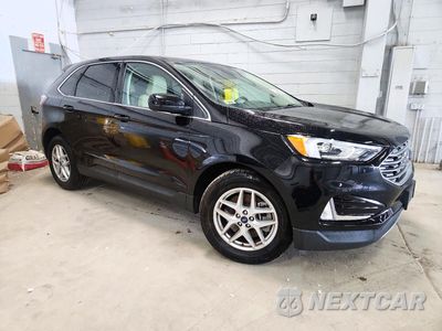 Czwarte zdjęcie samochodu z boku: 2021 FORD EDGE SEL VIN:2FMPK4J96MBA50141 - miniatura
