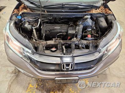 Zdjęcie 12 z 13 samochodu: 2016 HONDA CR-V EX VIN:5J6RM4H5XGL063113 - miniatura
