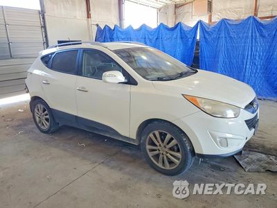 Czwarte zdjęcie samochodu z boku: 2012 HYUNDAI TUCSON LIMITED VIN:KM8JU3AC6CU318278 - miniatura