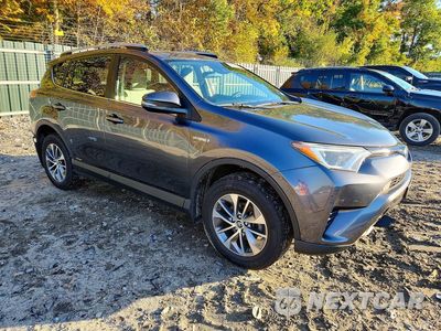Czwarte zdjęcie samochodu z boku: 2018 TOYOTA RAV4 HYBRID LE VIN:JTMRJREV4JD219972 - miniatura