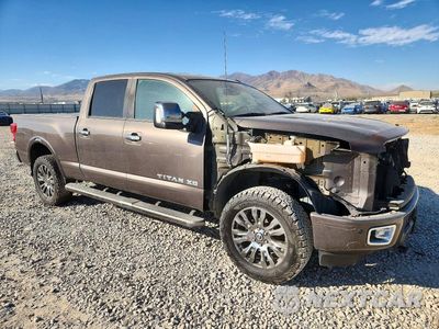 Czwarte zdjęcie samochodu z boku: 2016 NISSAN TITAN XD PLATINUM RESERVE VIN:1N6BA1F42GN513802 - miniatura