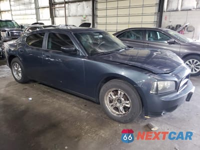 Czwarte zdjęcie samochodu z boku: 2007 DODGE CHARGER SE VIN:2B3KA43R67H866087 - miniatura